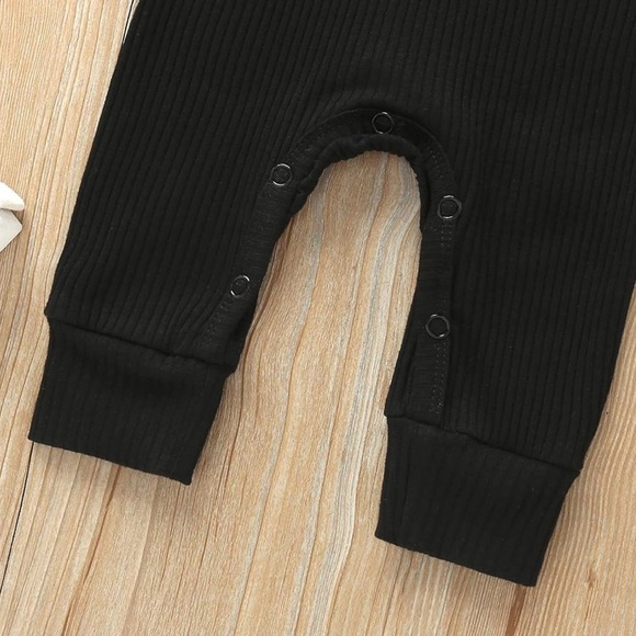 Baby Romper in Black with Henley Button Detail - Picture 4 of 5